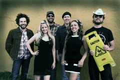 The band: (left to right): Lonnie Trevino, Jr. (bass, vox), Barbara Nesbitt (vox, guitar, ukulele), Michael Davids (keys), Phil Bass (drums), Teal Collins (vox, guitar, ukulele), Josh Zee (lead guitar)