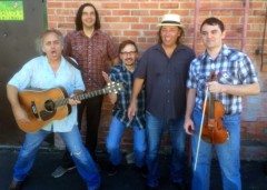 The Buskers, still making music and mischief today: Joey Harris, T Bone Larson, Jef Kmak, Shawn, and John-Michael Brooks. Photo by Dennis Andersen.